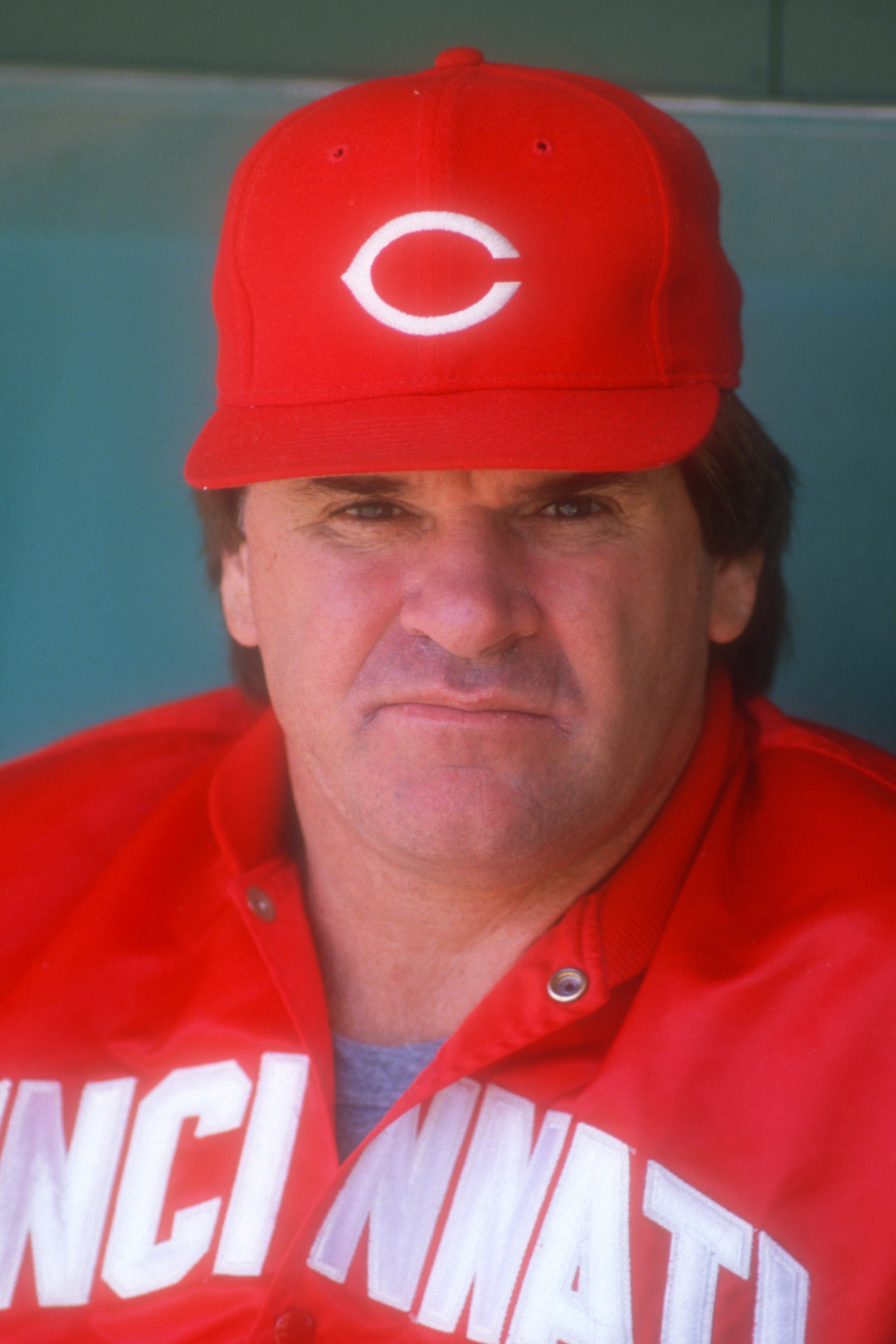 Manager Pete Rose #14 of the Cincinnati Reds looks on before a baseball game against the Philadelphia Phillies on May 11, 1988