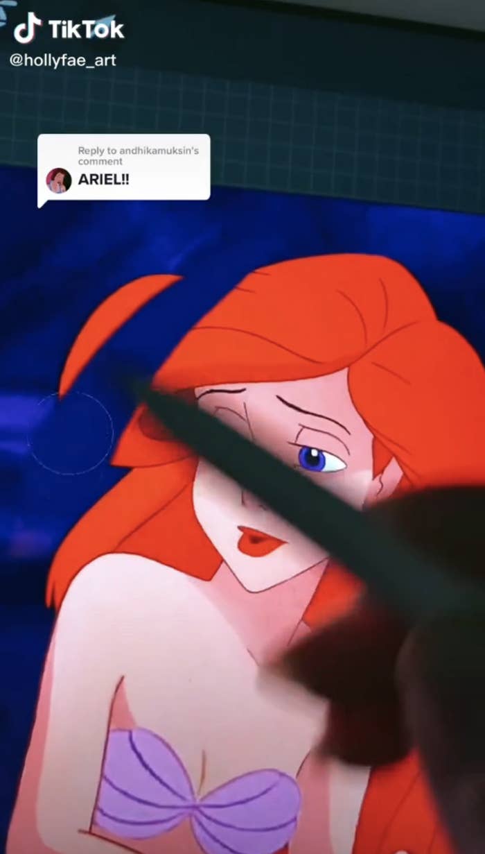 The artist erasing part of Ariel&#x27;s hair using a stylus
