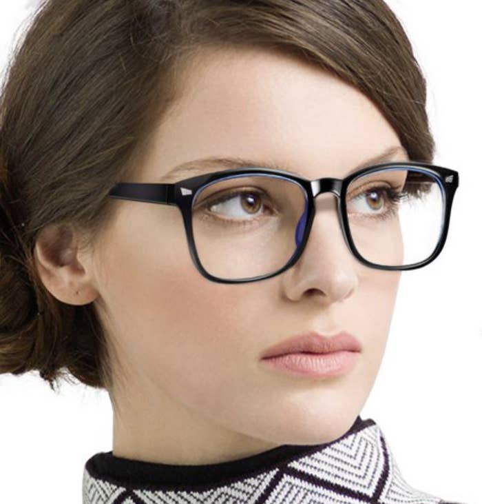 a model wearing the glasses in black