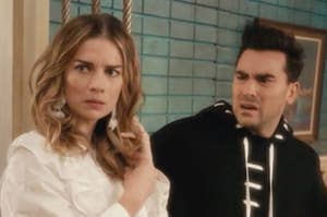 Siblings David and Alexis Rose from "Schitt's Creek" look completely bewildered