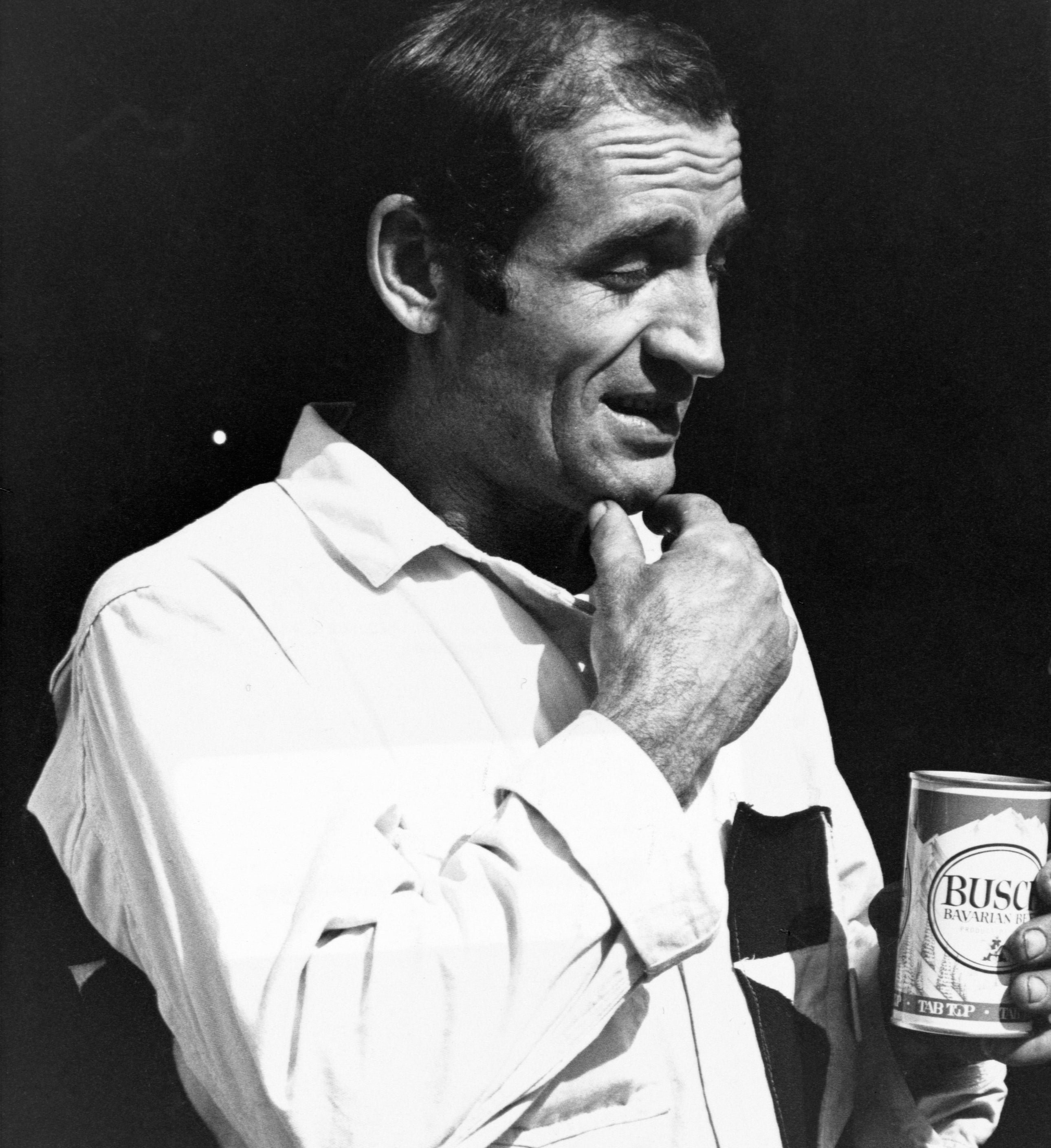 Jack Karouac, author of The Dharma Bums, holding a can of Busch beer