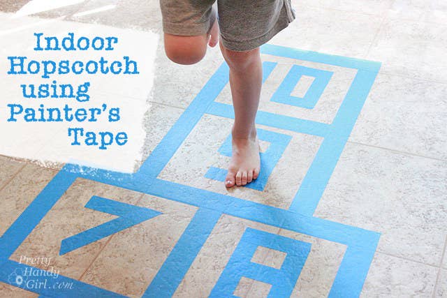 Blogger&#x27;s photo of the indoor hopscotch grid they created with tape