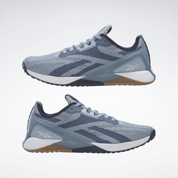 gray and light blue athletic training sneakers with Reebok logo on heel