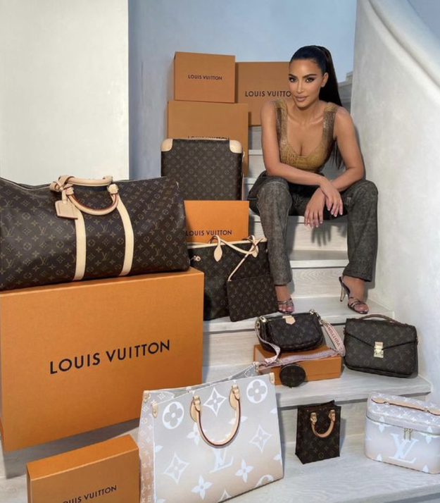 Kim Kardashian Instagram of Louis Vuitton printed snake sparks