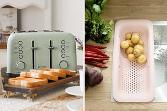 a teal retro-style toaster oven / a pale pink rectangular colander stretched over a kitchen sink