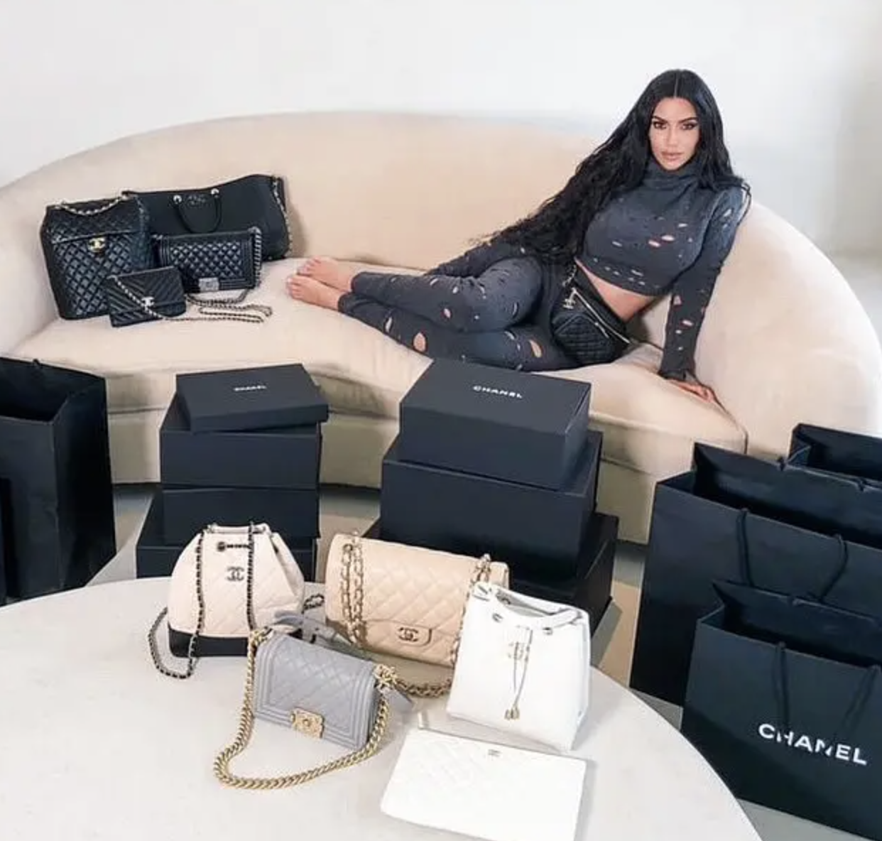 Kim Kardashian left her Instagram fans bewildered with a Louis Vuitton  printed snake - Luxurylaunches