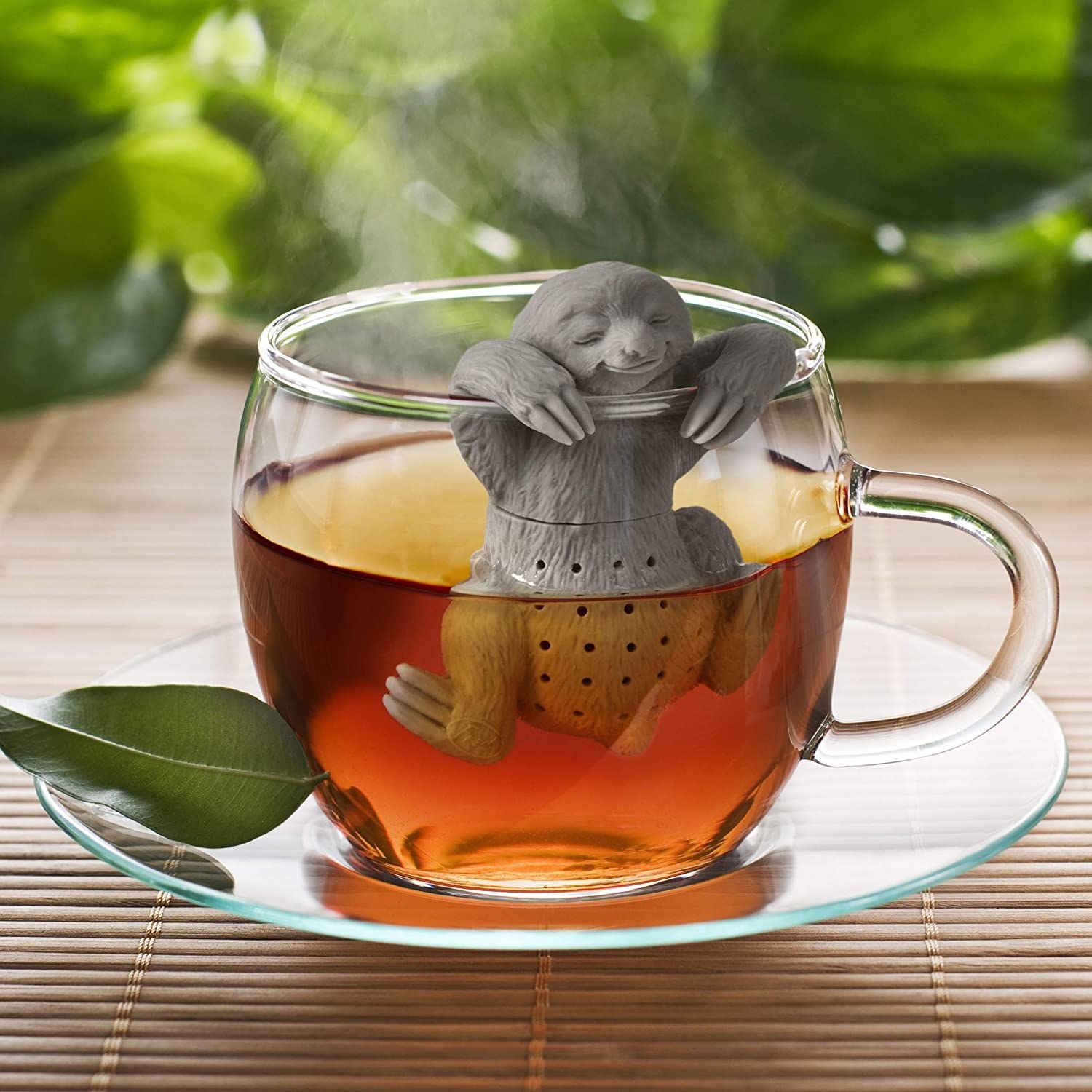Sloth tea diffuser in a glass mug