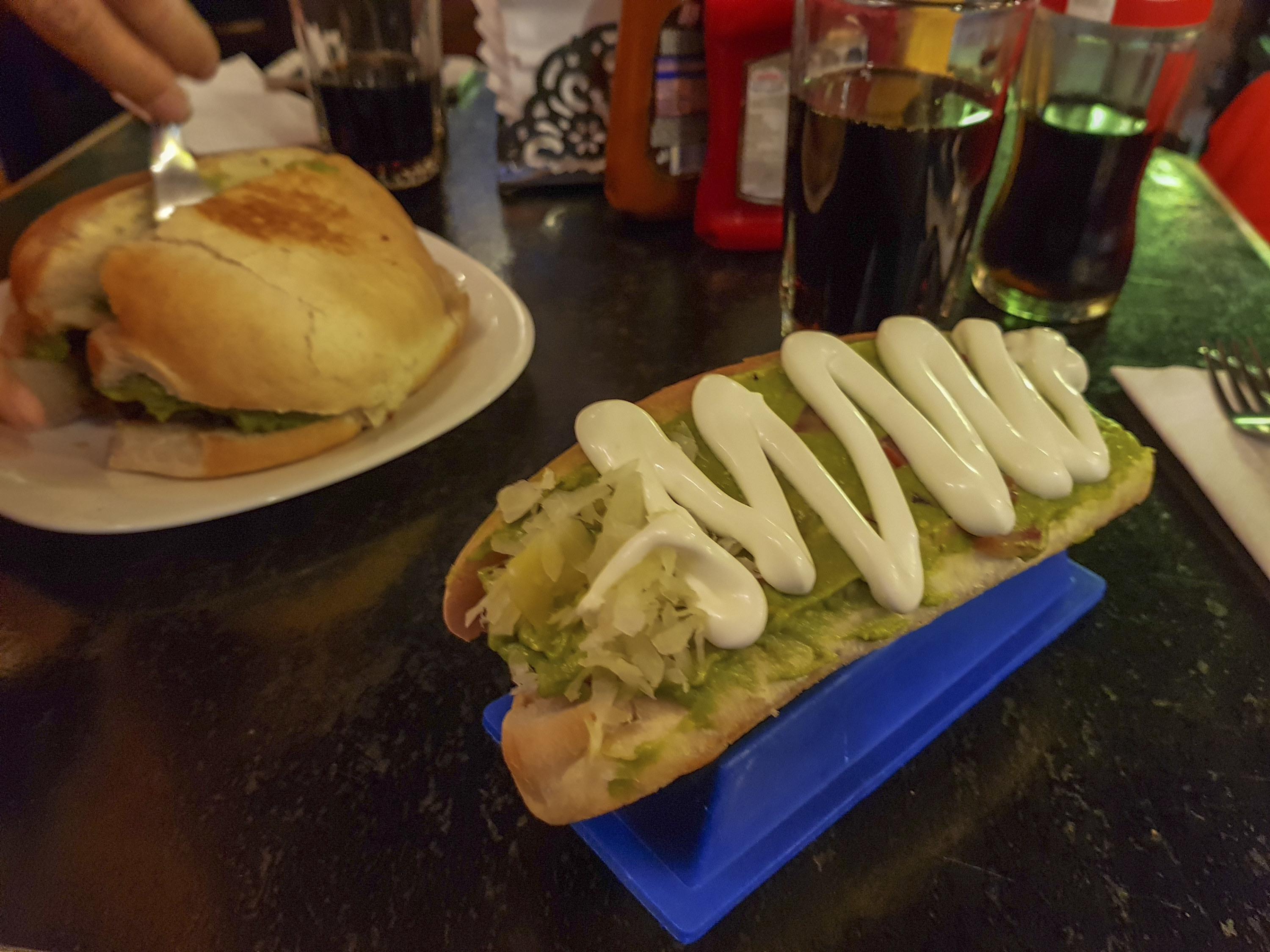 A hot dog with toppings