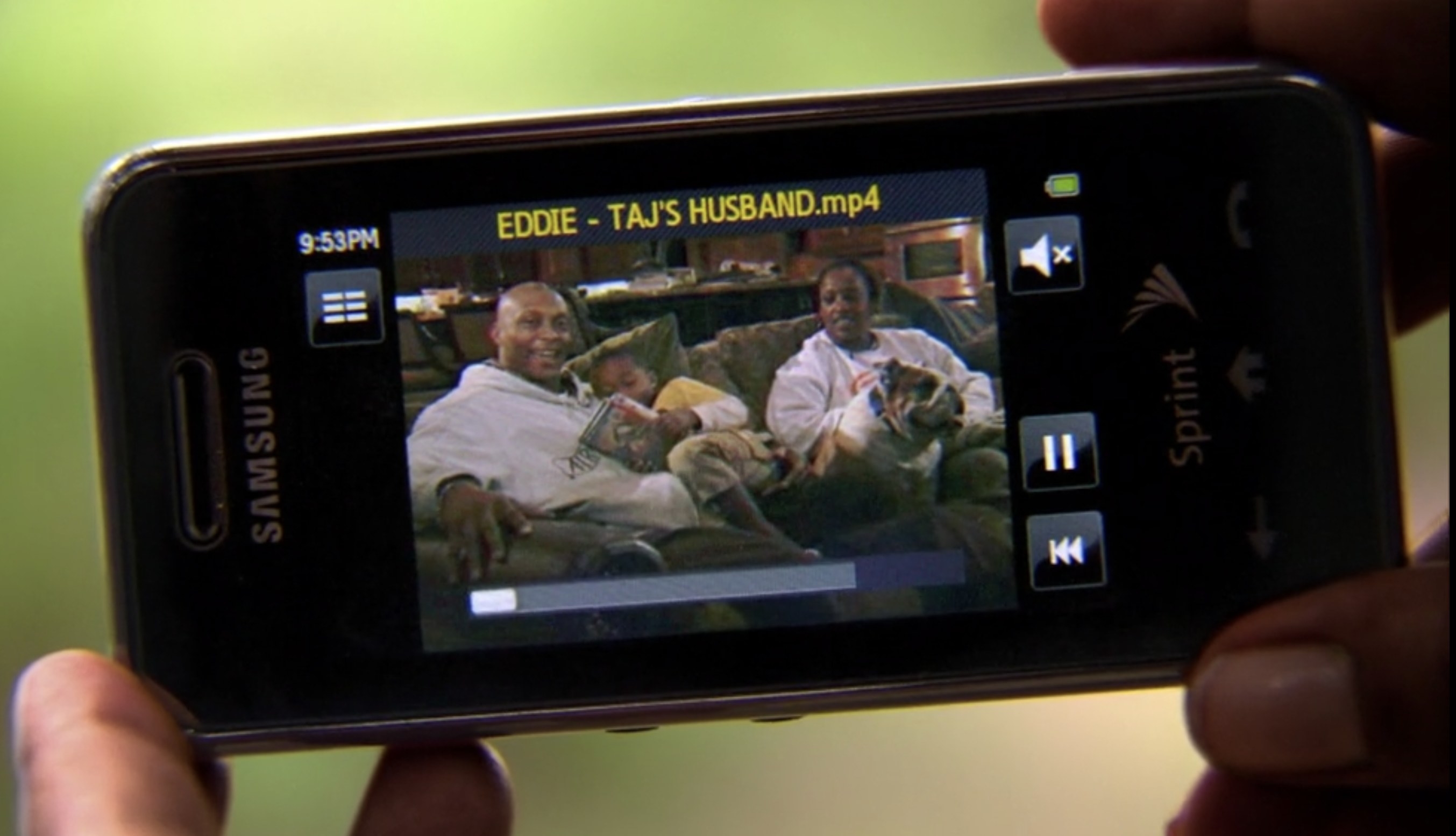 a video message from Taj&#x27;s husband on a small sprint phone from the mid-2000s