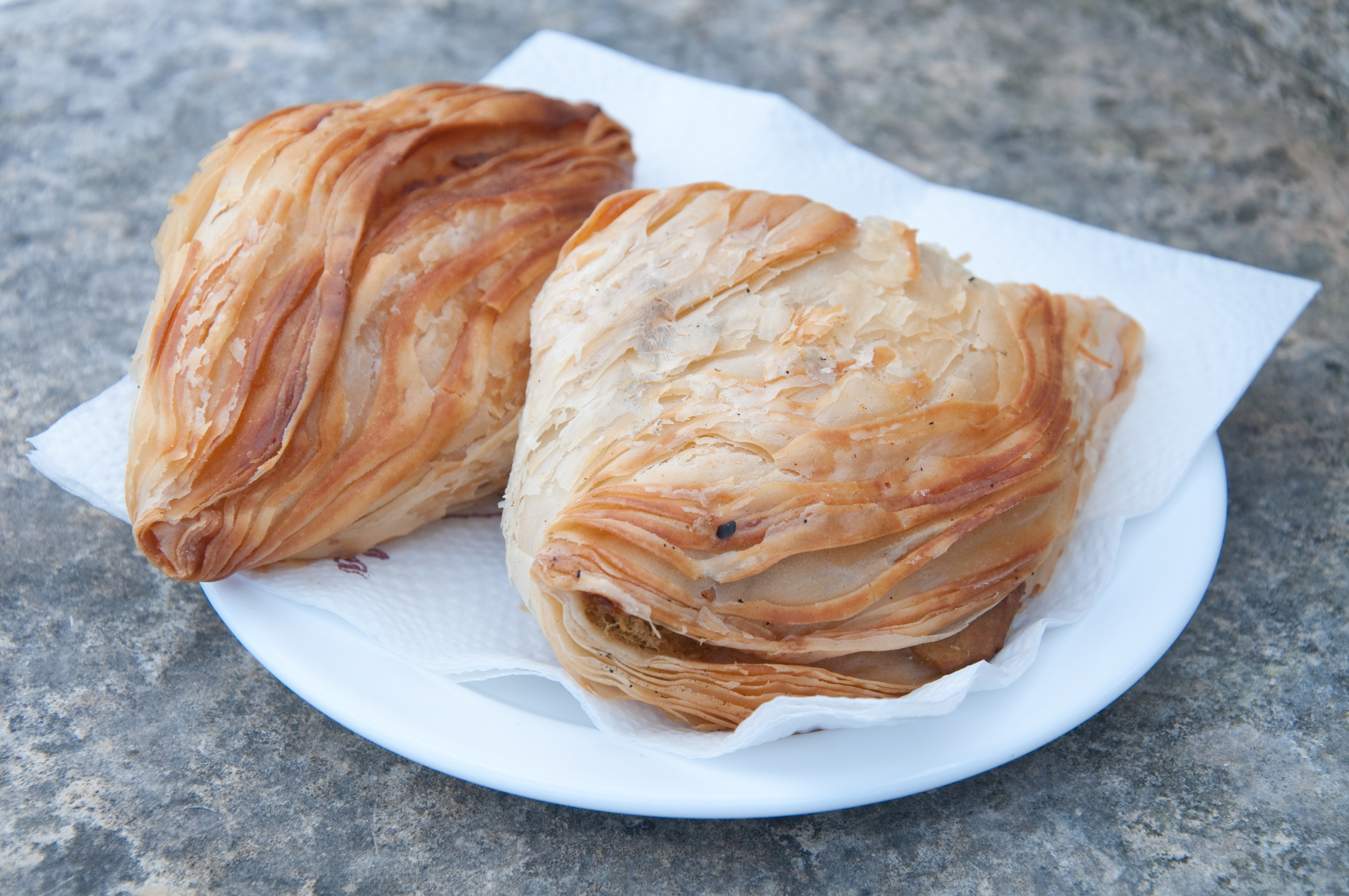 Two pastizzi from street vendors