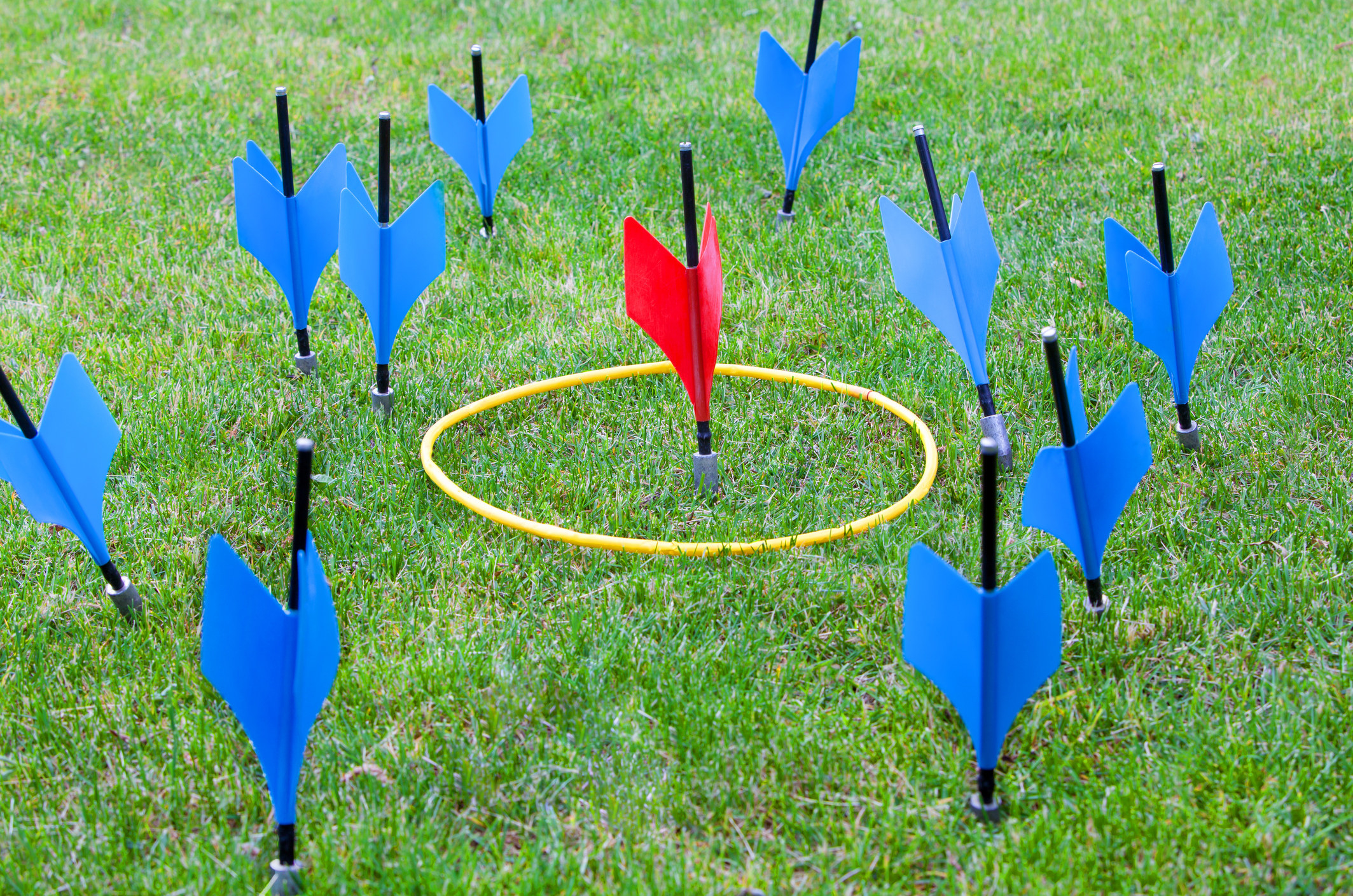 Lawn darts sticking up from the grass