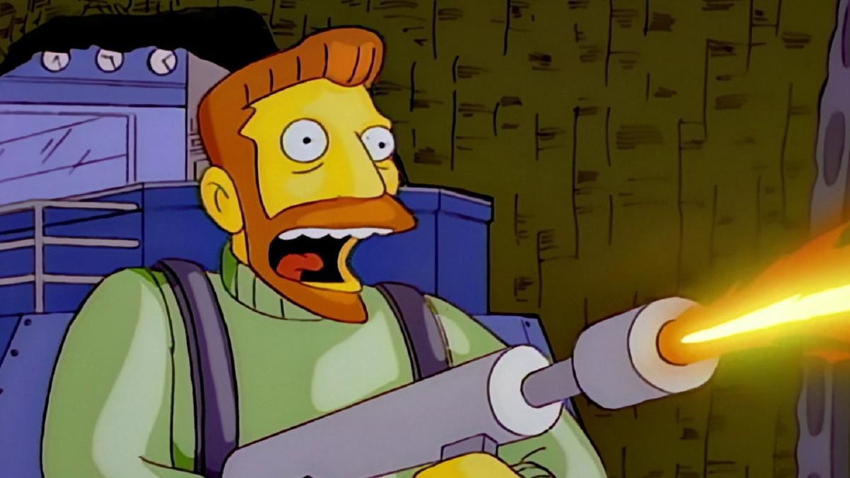 Hank Scorpio from The Simpsons blasts a flamethrower