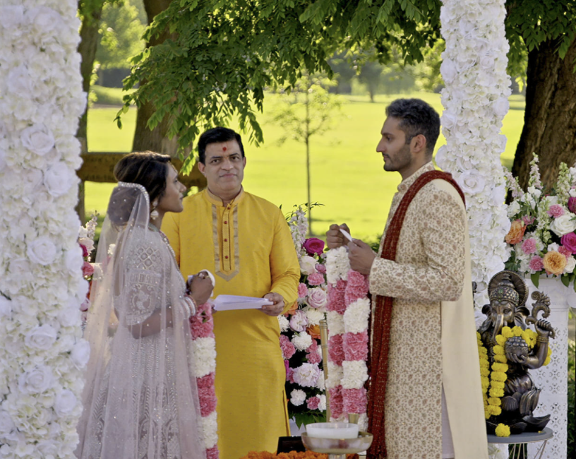 Deepti and Shake are standing at the altar