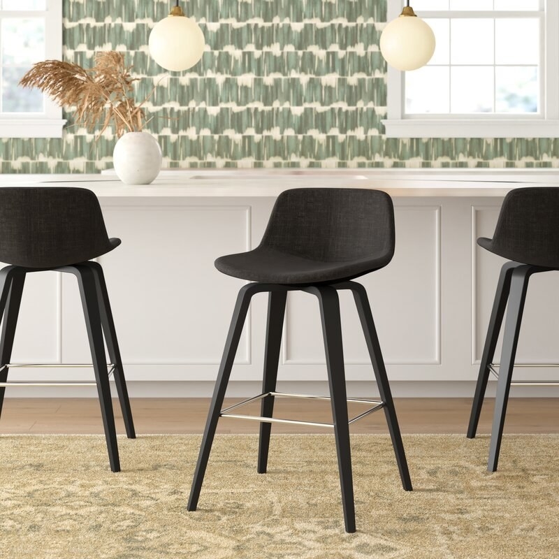 the black counter stools