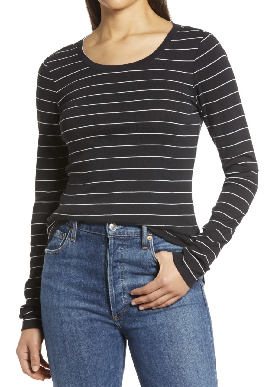 a person wearing the top in black and white stripes