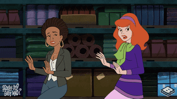 Daphne and another woman sneaking around on &quot;Scooby-Doo Guess Who?&quot;