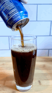 GIF of author pouring Nitro Pepsi into a pint glass