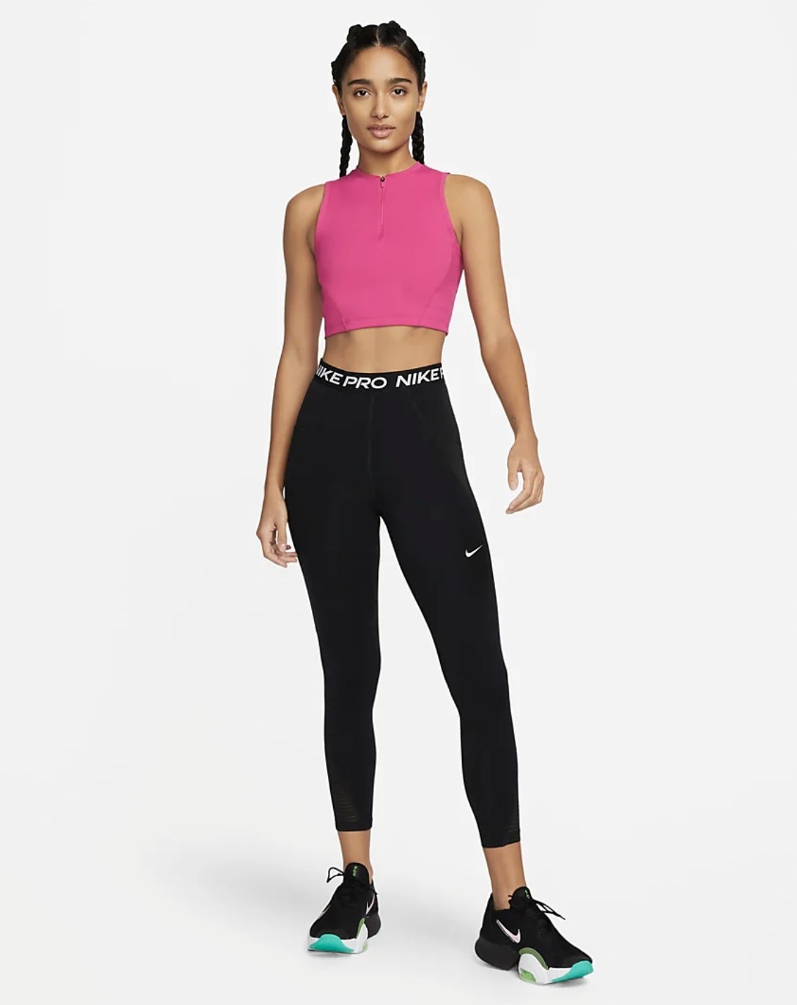 Model wearing the leggings with pink athletic crop top