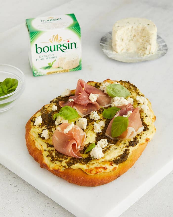 Fluffy flatbread topped with prosciutto, Boursin® Cheese, and basil