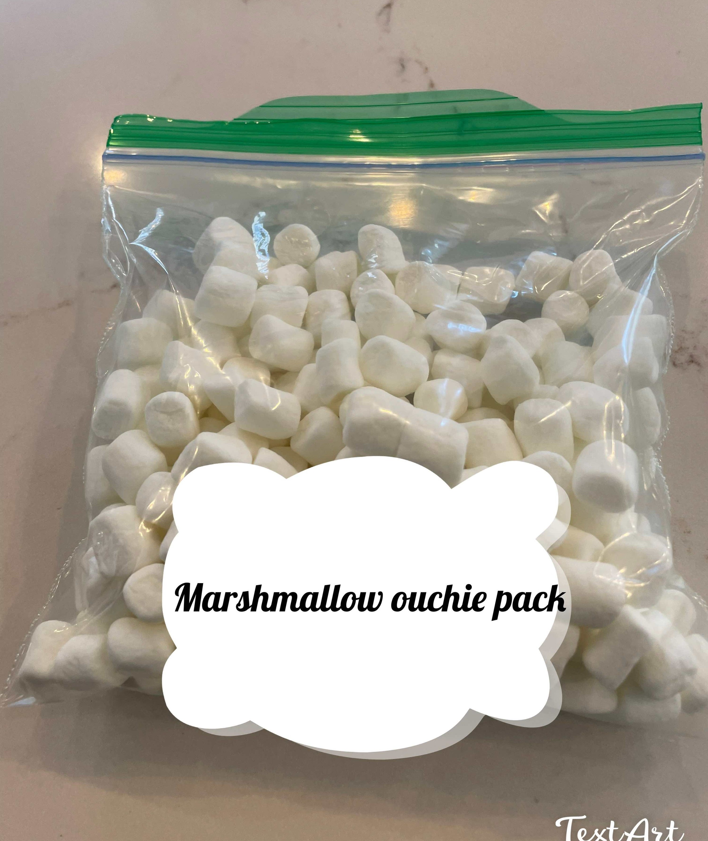 A photo of frozen marshmallows in a Ziploc bag