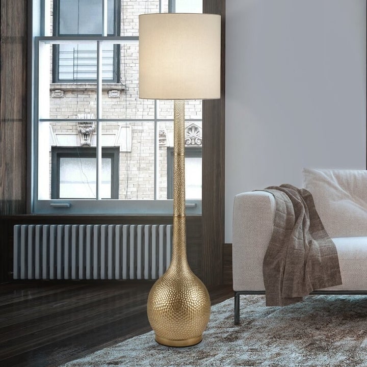 gold floor lamp with white shade