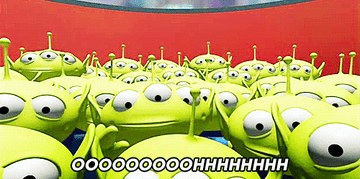 the little green aliens from toy story saying ooooooh