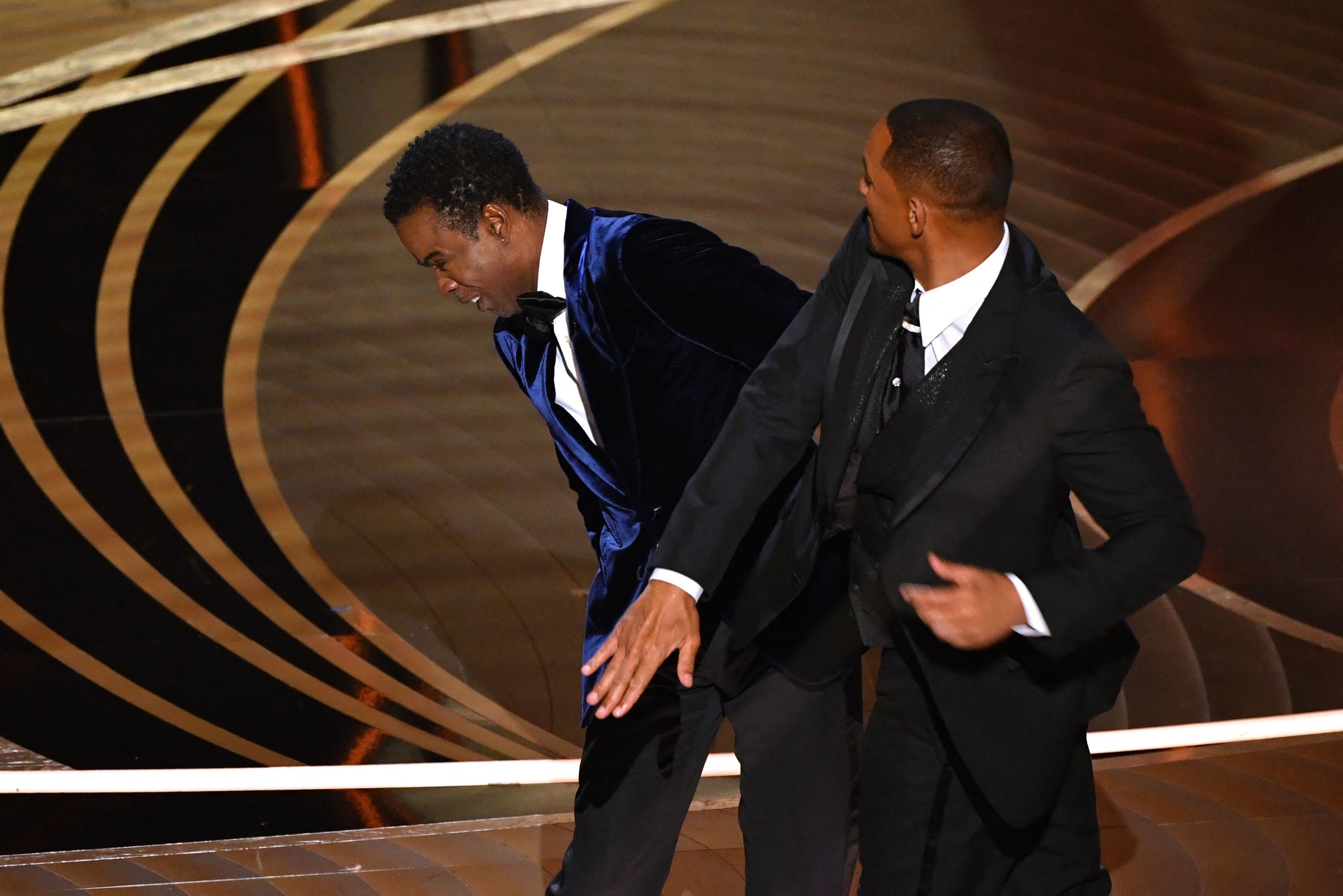 Will smith slapping chris rock in the face at the 2022 oscars ceremony