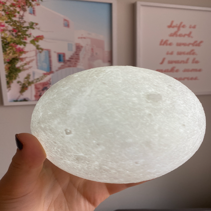 Emma holding the lamp