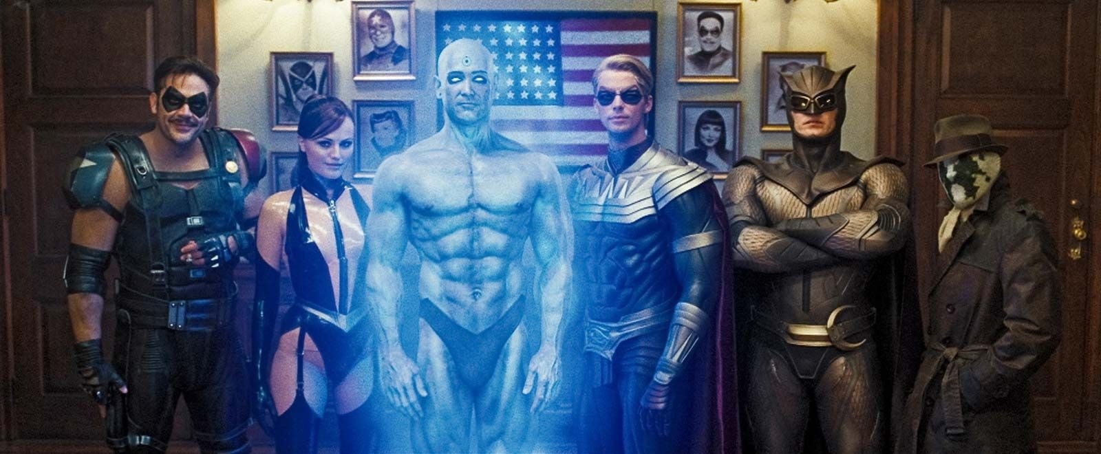 The Watchmen stood in a line, from left to right: The Comedian, Silk Spectre II, Dr Manhattan, Ozymandias, Nite Owl II and Rorschach