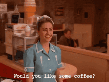 Waitress saying would you like some coffee