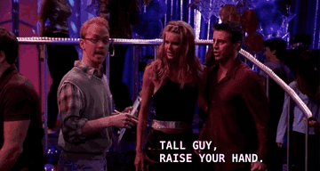 Friends episode shows a man at a party calling another man he has nicknamed tall guy while Joey stands to the side with Janine