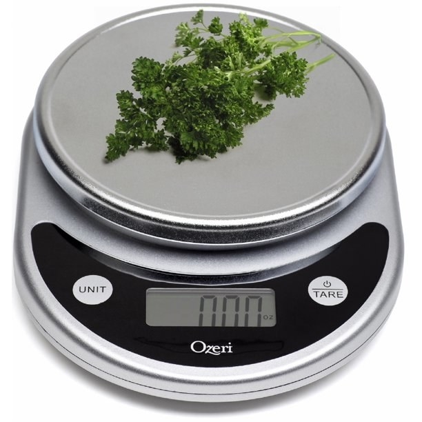 the digital food scale with parsley on top