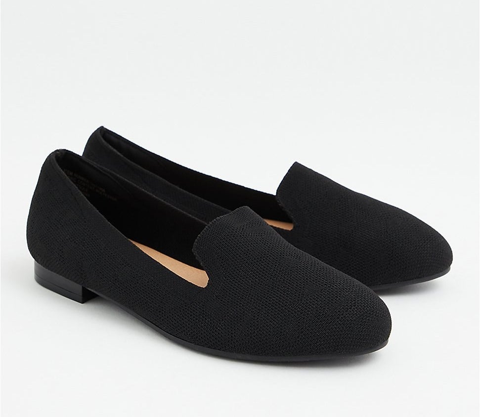 the pair of black knit loafers