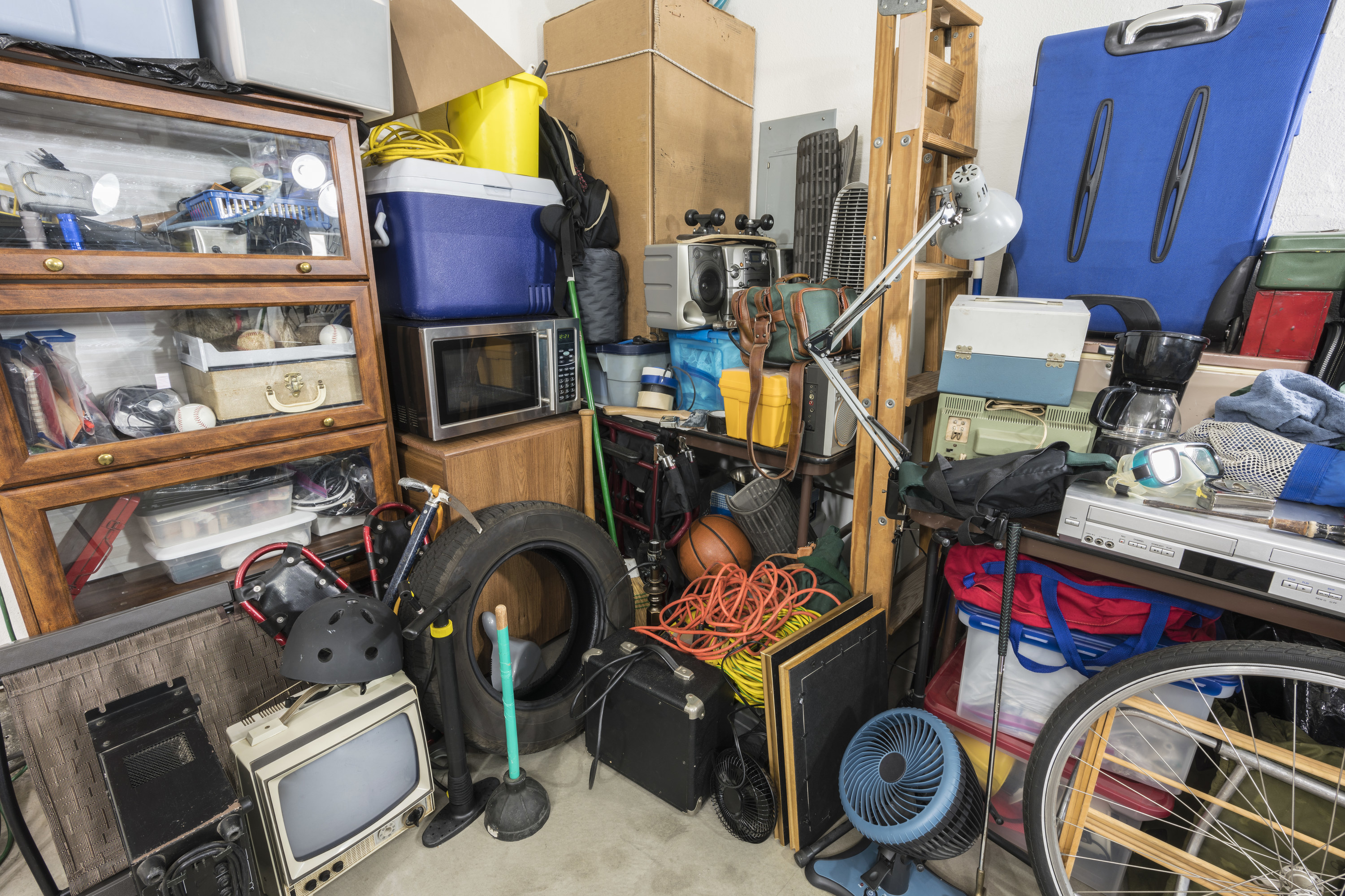 a garage filled with old tires and random things