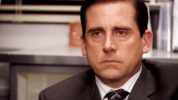 Steve Carell as Michael Scott stares with a blank expression in &quot;The Office&quot;