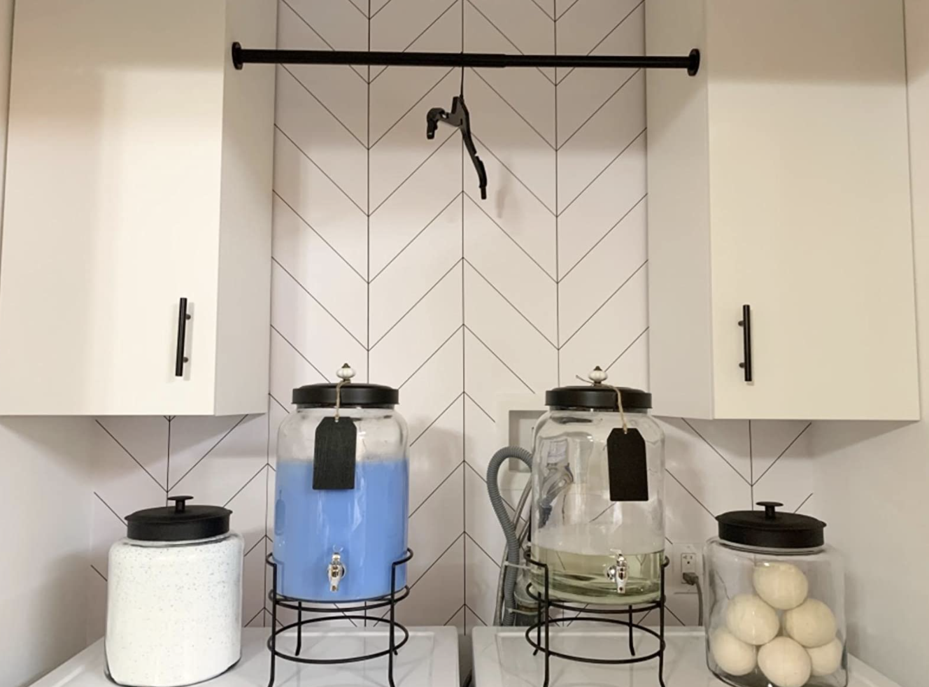 A reviewer&#x27;s laundry room with the wallpaper