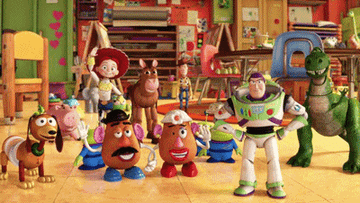 the toys from toy story waving