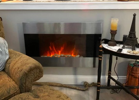 Review photo of the wall-mounted fireplace