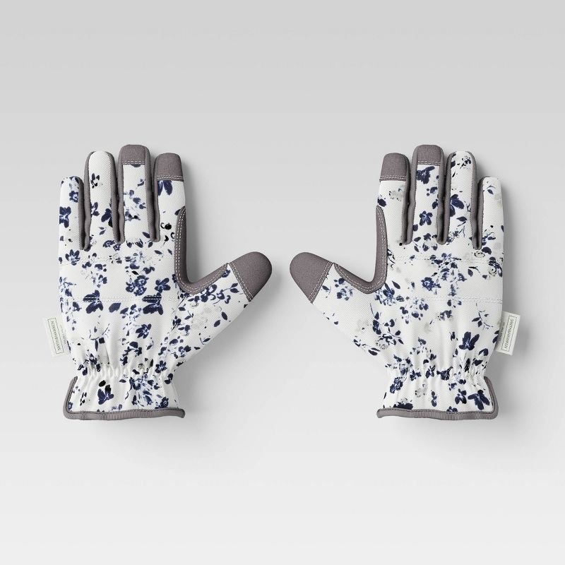 the white and grey gloves with blue floral design