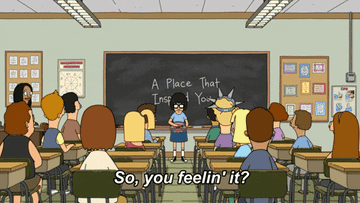 Tina talking in front of her classroom