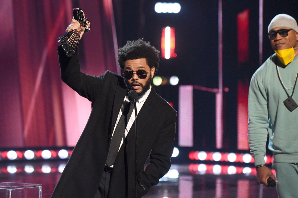 the weeknd on stage at an awards show