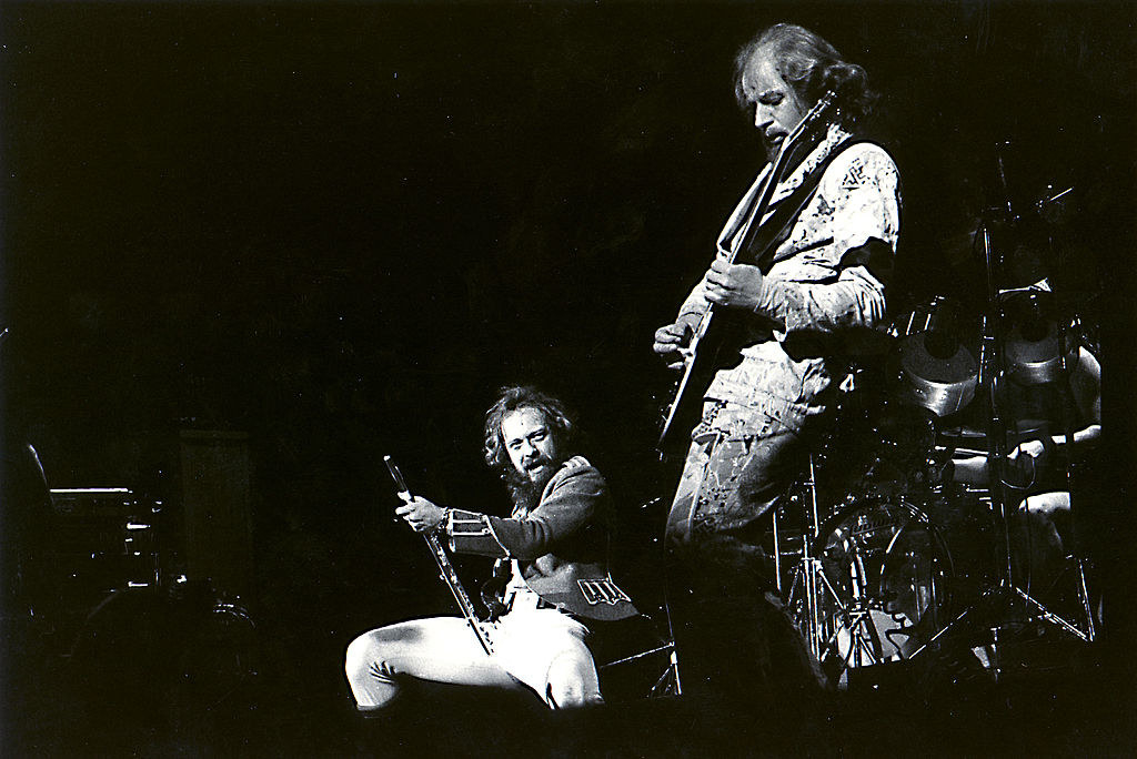 a black and white photo of the band performing