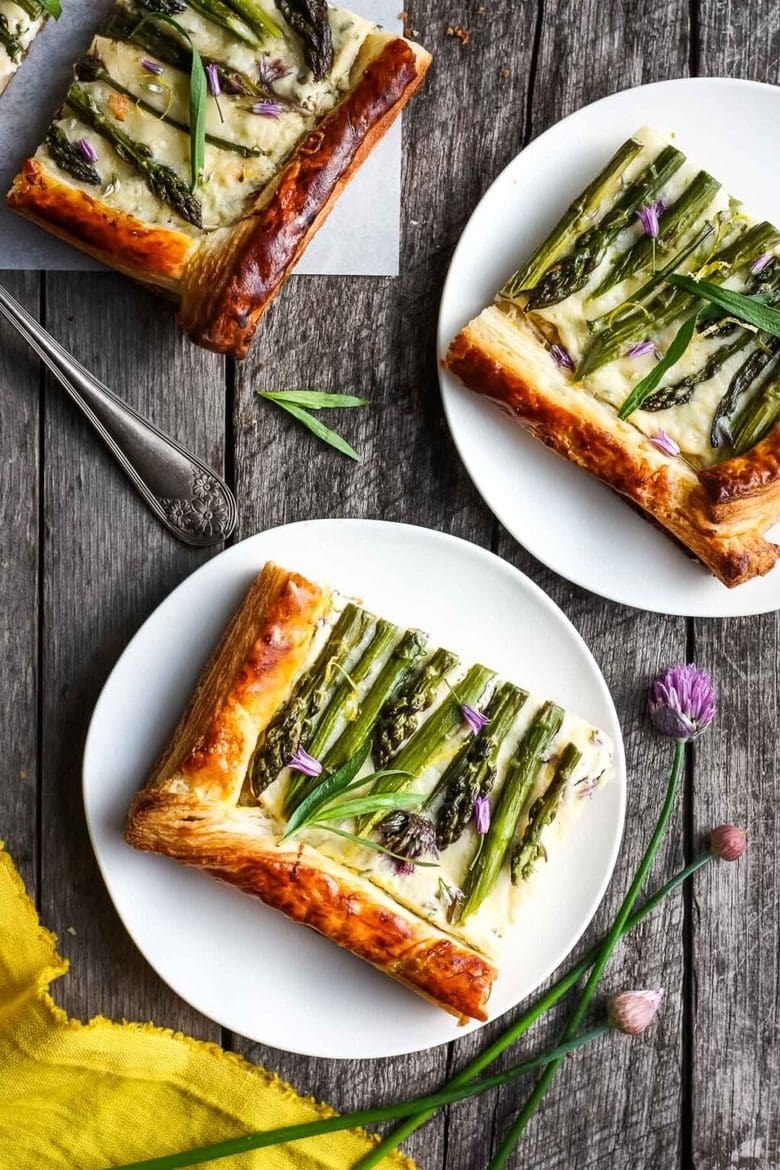 Slices of an asparagus tart with cheese