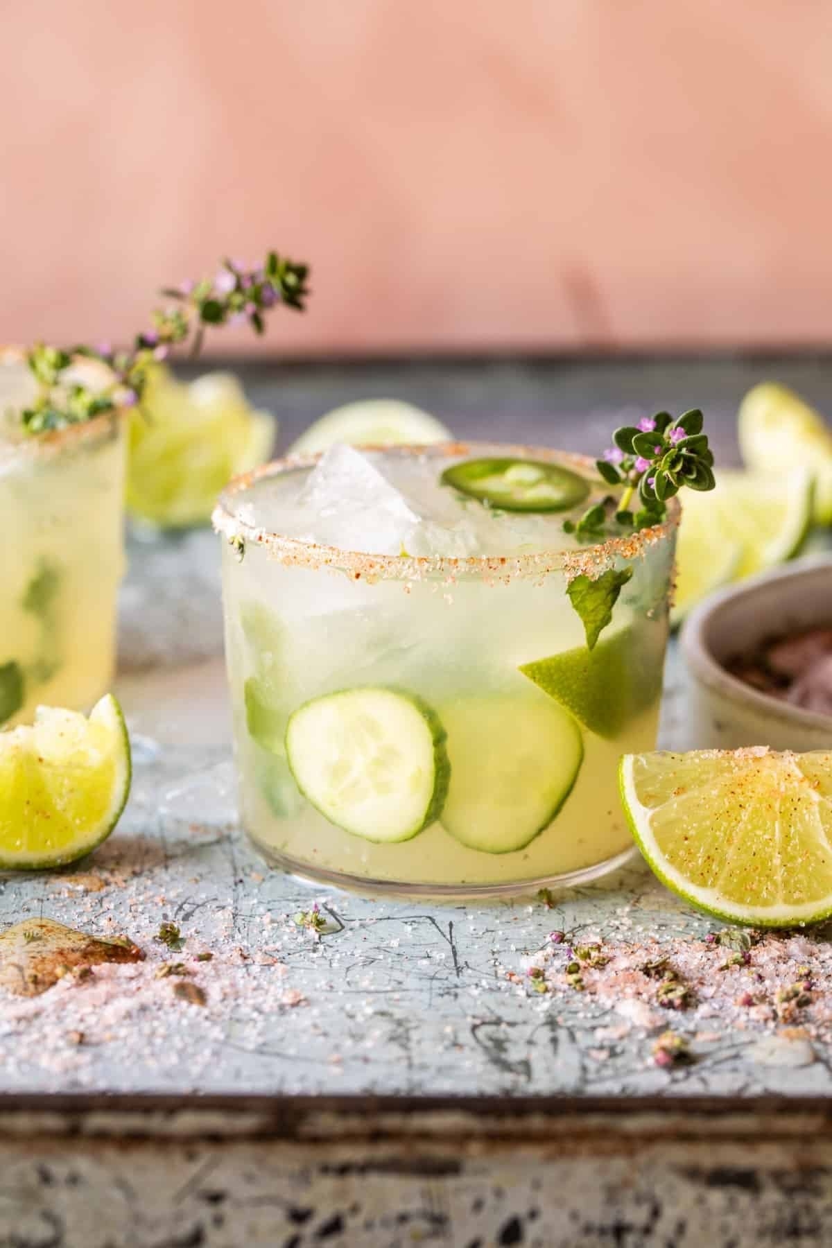 Two cucumber margaritas with lime and mint