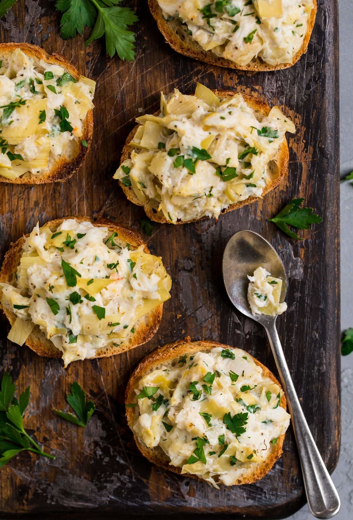 Crab and artichoke toasts