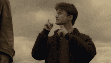 GIF of Harry Potter moving his index fingers