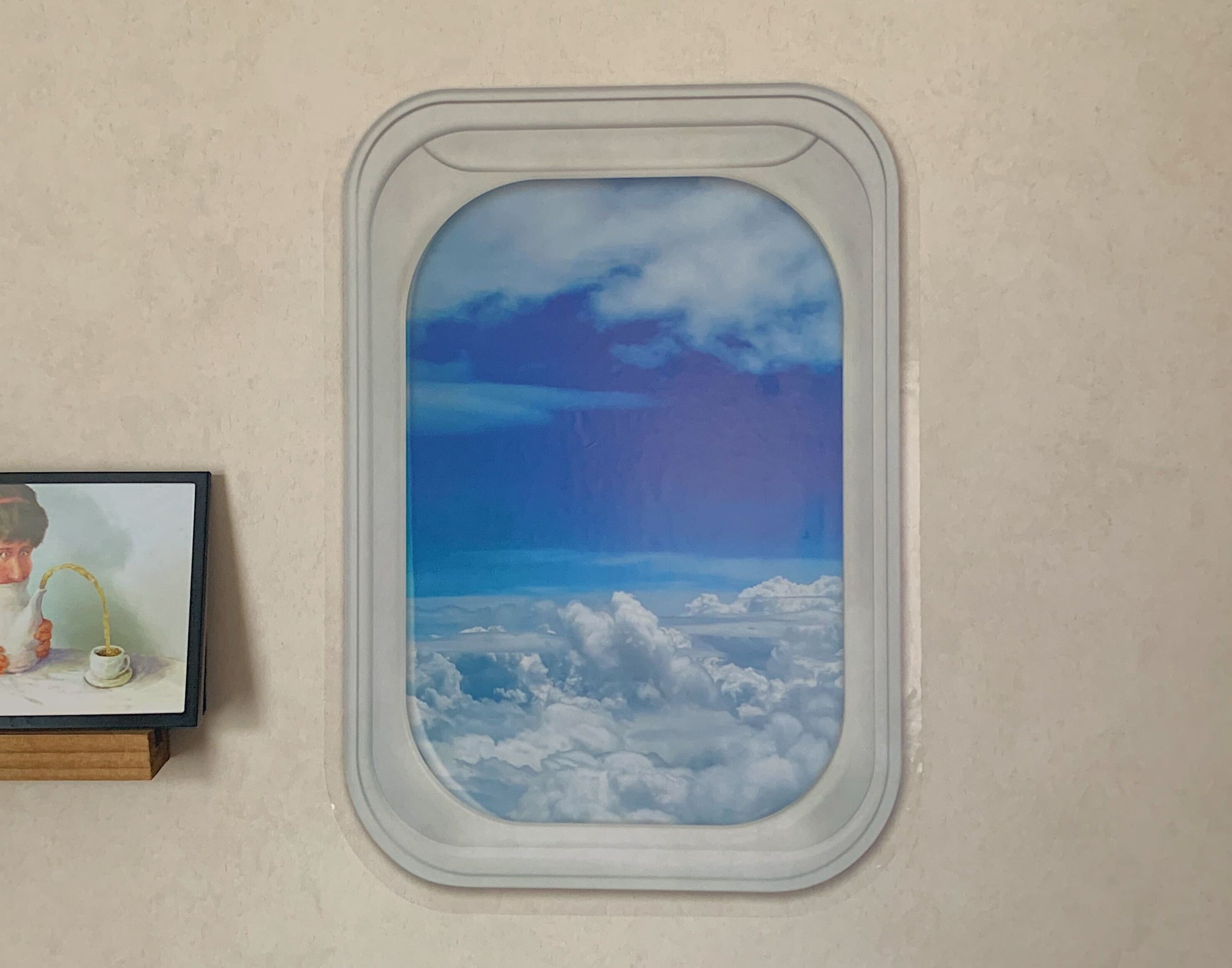ダイソーの「ウォールステッカー(窓、背景、雲海)」
