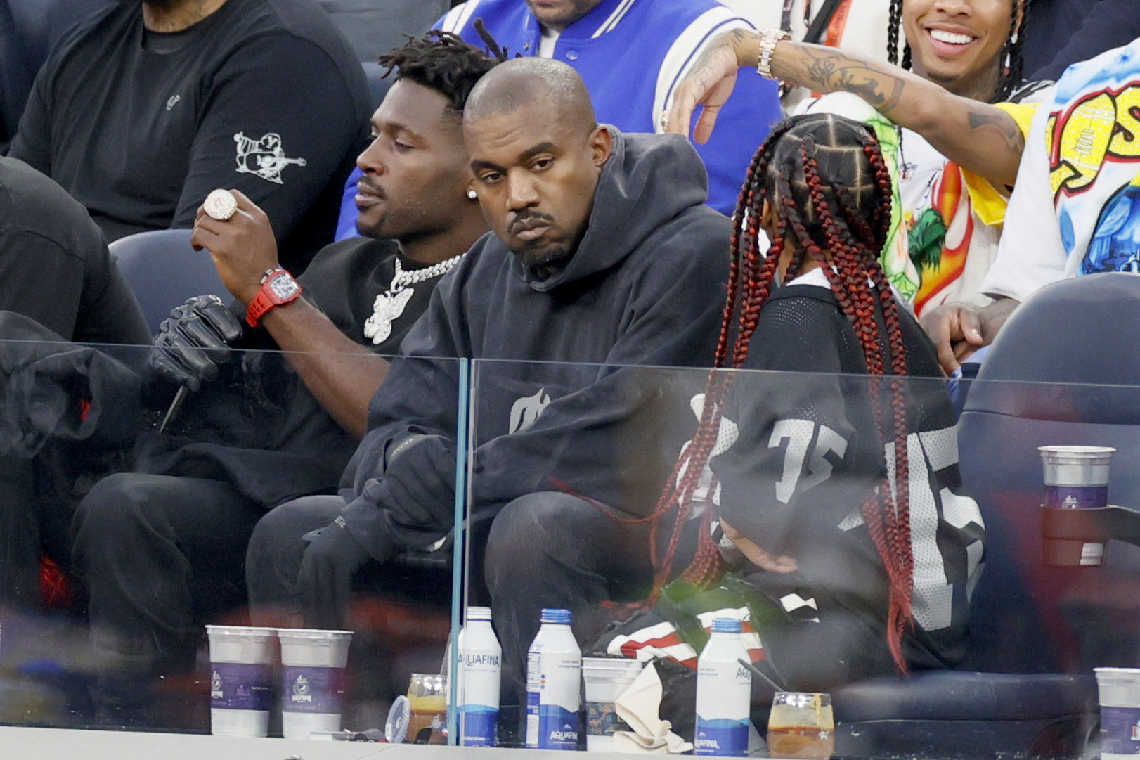 Antonio Brown, Kanye West, and North West at the Super Bowl
