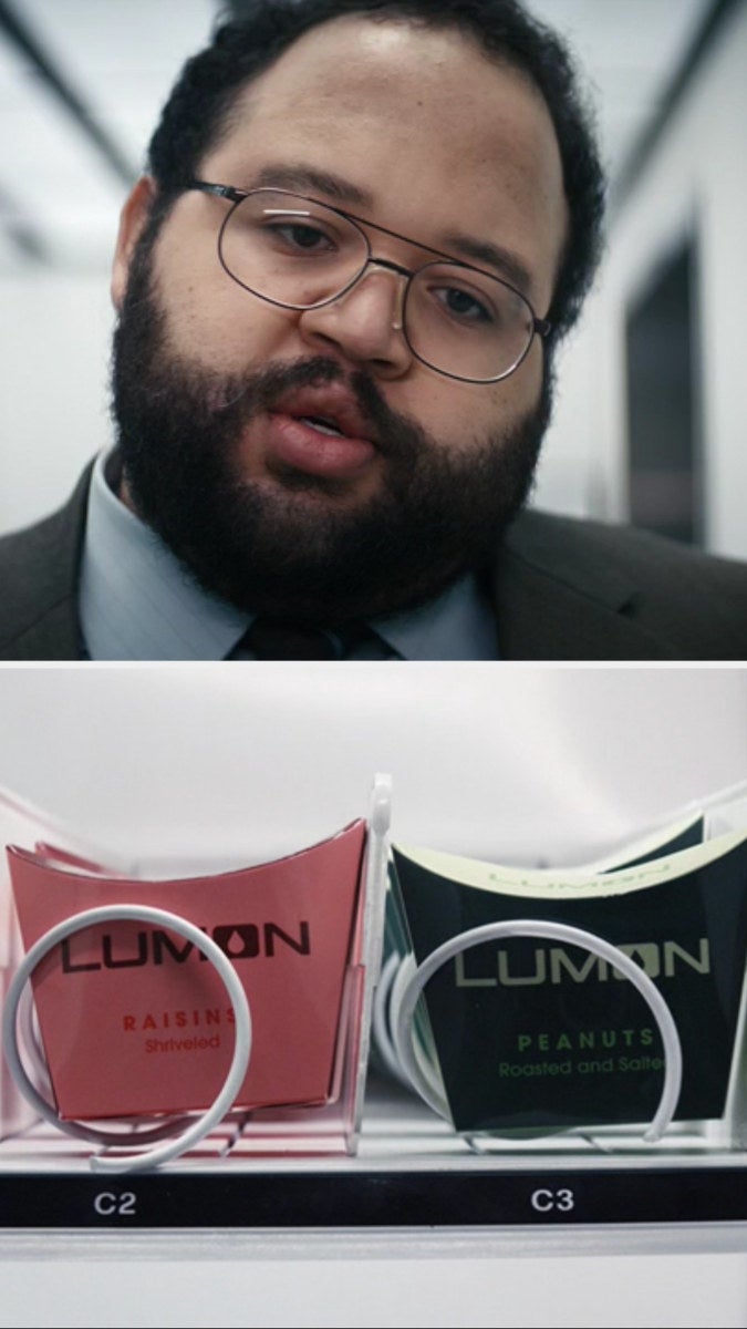 Dylan choosing a Lumon brand healthy snack from a vending machine