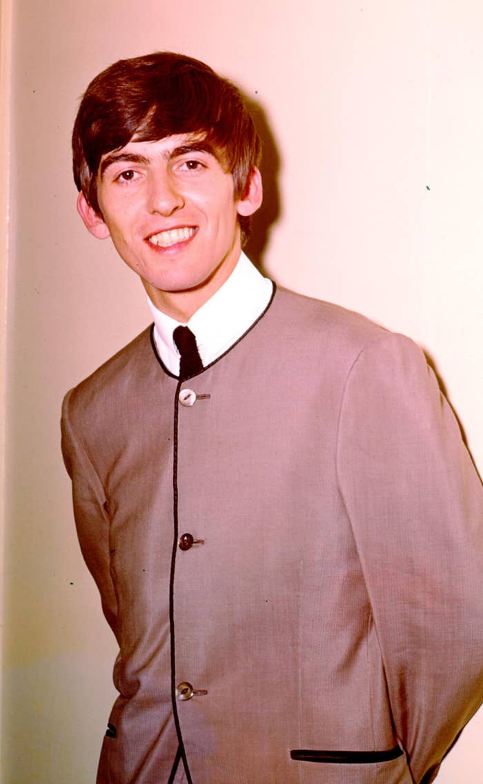 Harrison posing for a portrait during the Beatles days in 1964
